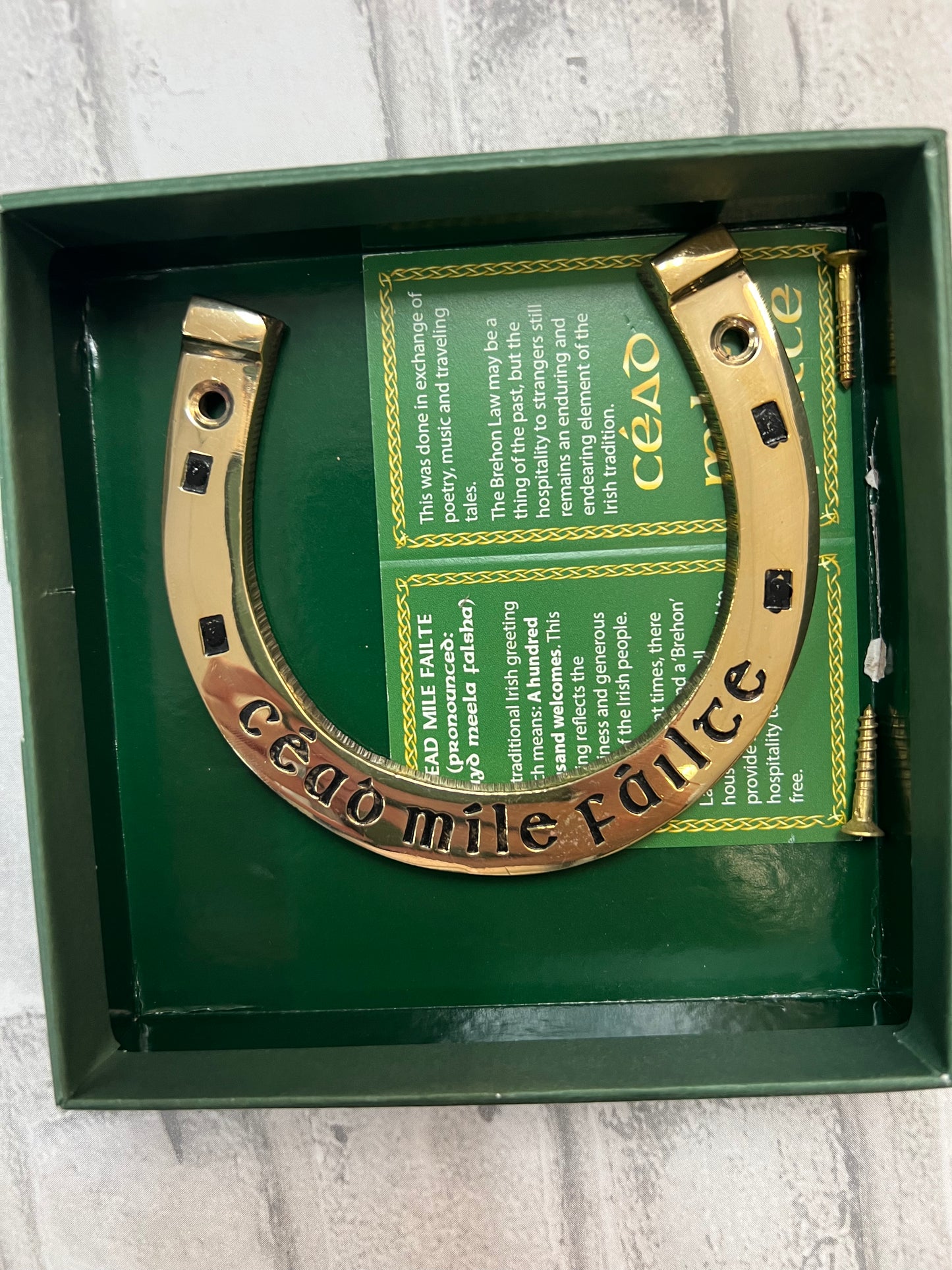 Brass horseshoe with Cead Mile Failte