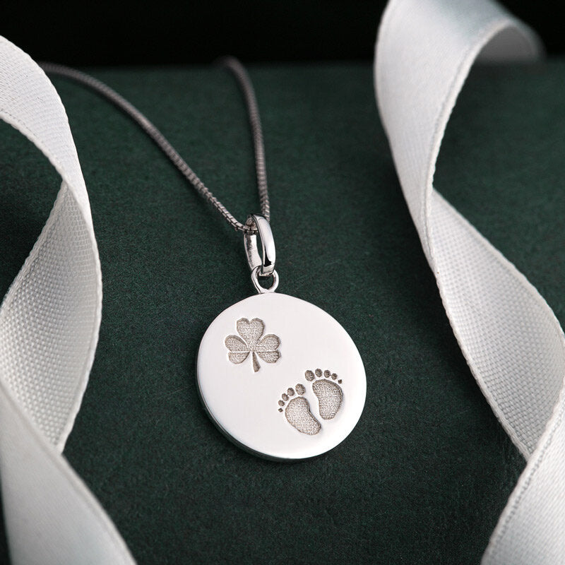 SILVER SHAMROCK BABY FEET DISC PENDANT s46891
