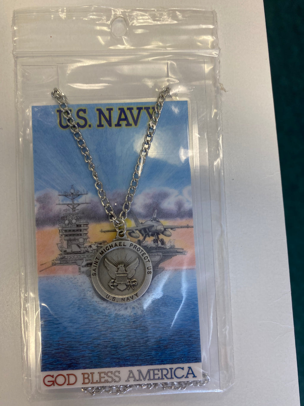 US navy medal with prayer card