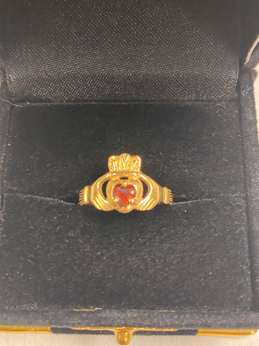 Gold Claddagh Ring with Garnet Stone