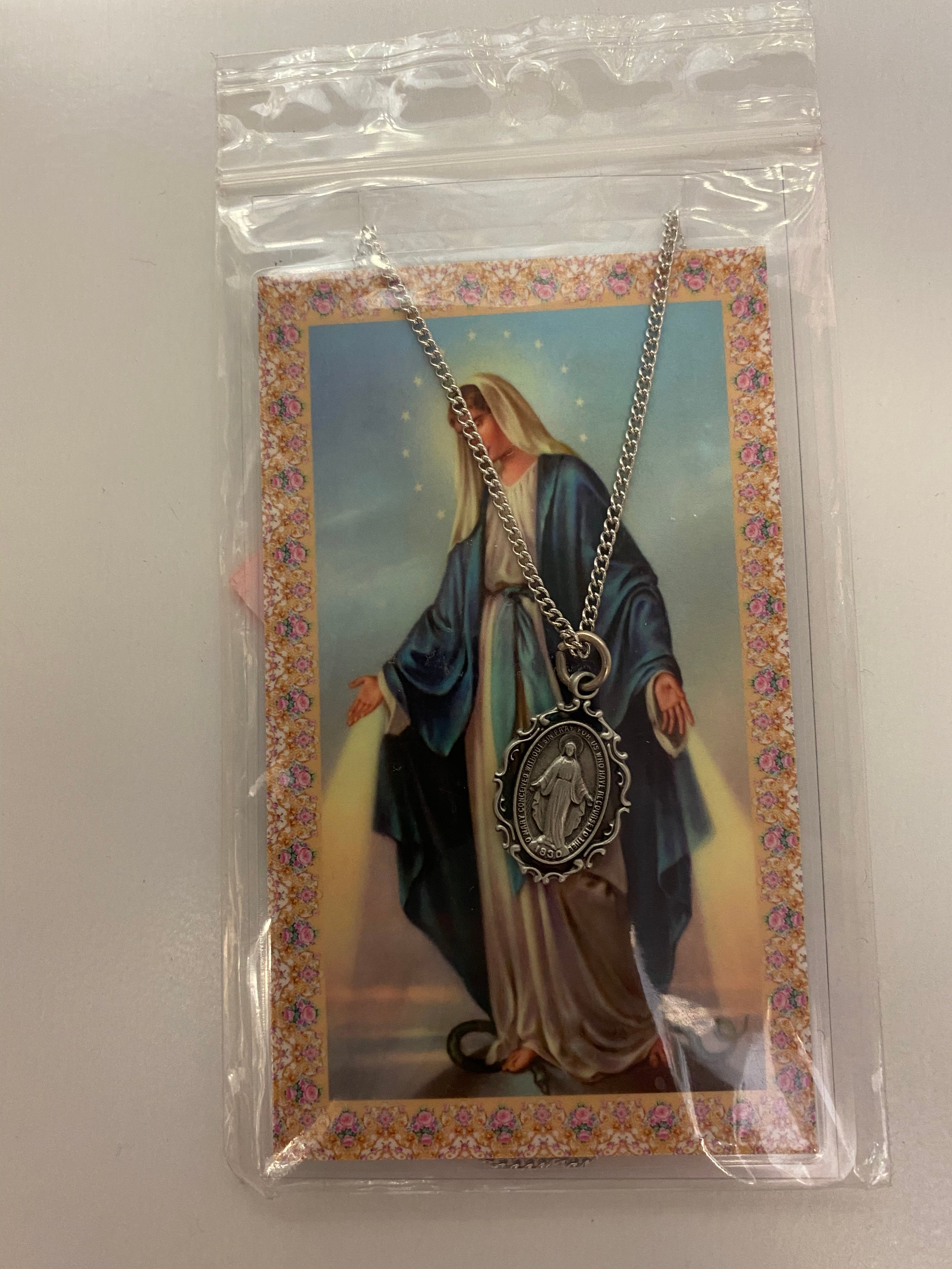 Miraculous medal with prayer card