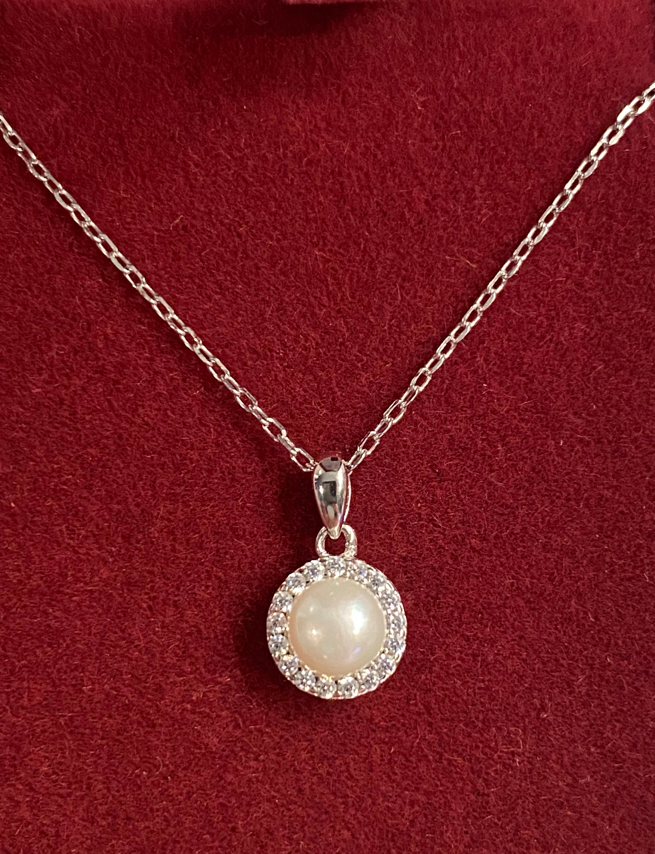 Silver Pearl with stones