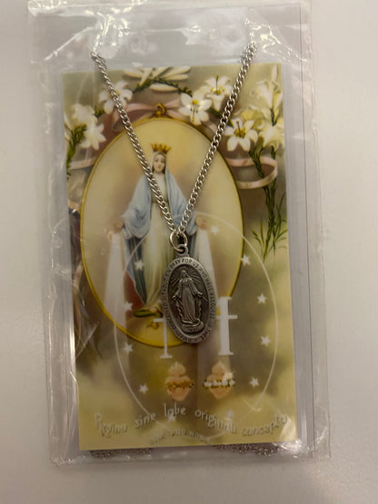 Miraculous medal with prayer card