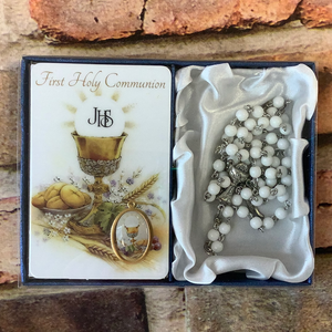 First communion rosary with prayer card