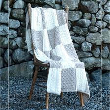 Natural/tan patch throw Aran woolen mills