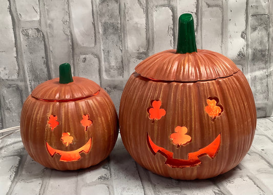 Light up pumpkins with shamrock eyes