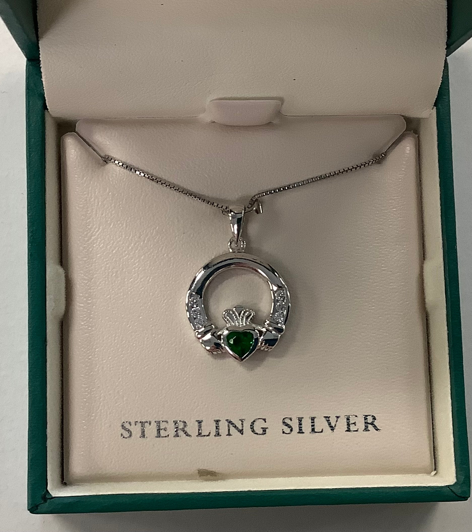 Sterling silver Claddagh with green stone S4559