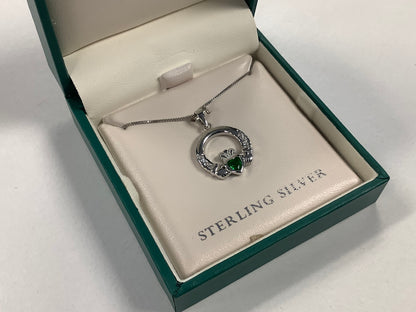 Sterling silver Claddagh with green stone S4559